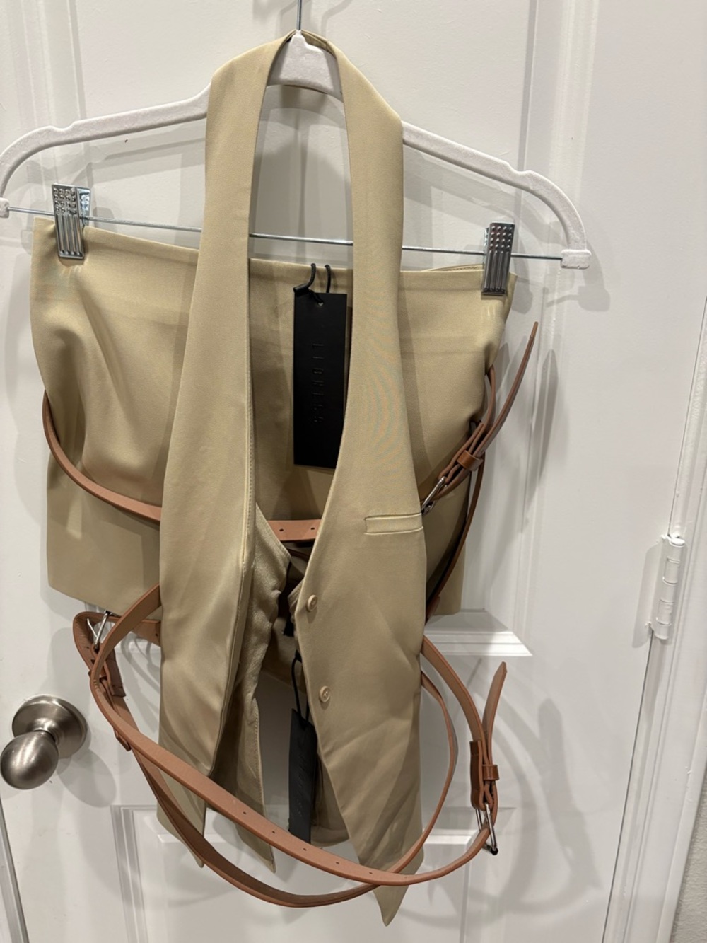 Lioness Beige Vest with Black Tag Detail